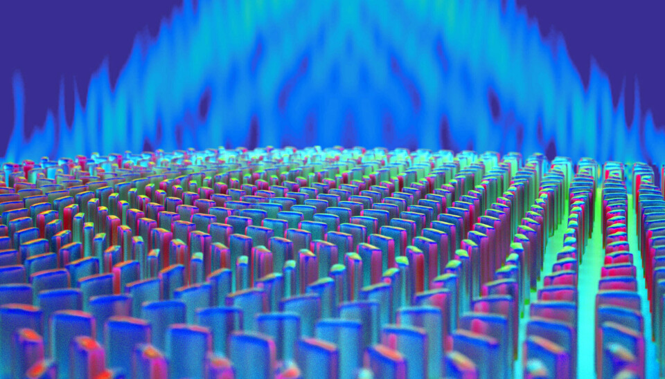 Här en illustration av den ultratunna metalinsen. Linsen består av nanofenor på ett glassubstrat, och fokuserar det inkommande ljuset på en och samma punkt.